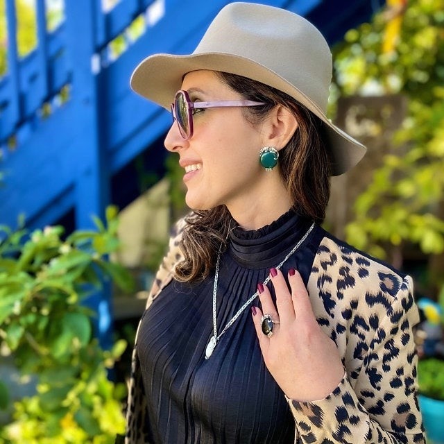 Model wearing jewellery from Ari D Norman.